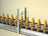 Extra Distance Inductive Sensors Detect Presence of Aluminum Closures on Food Containers